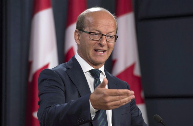 Leader of the Opposition in the Senate, Senator Claude Carignan speaks at a news conference in Ottawa, Monday October 3, 2016. Carignan has introduced a bill he calls the first concrete legislative measure in Canada to protect journalistic sources.