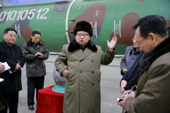 North Korean leader Kim Jong Un meets scientists and technicians in the field of research into nuclear weapons in this undated photo released by North Korea's Korean Central News Agency in Pyongyang March 9, 2016.     