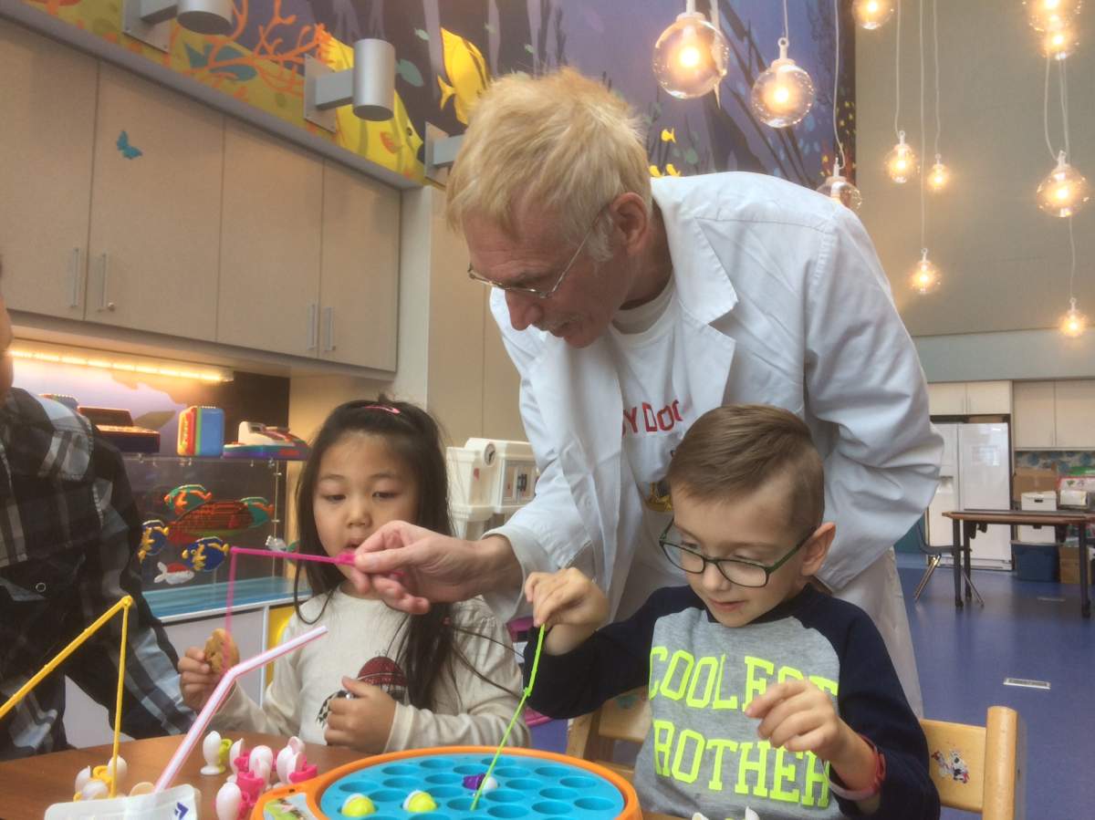Norman Brown, the toy doctor, visits children at the Montreal Shriners Hospital, Tuesday, November 22, 2016.