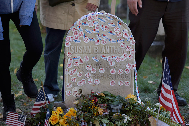 People visit the grave of women’s suffrage leader Susan B. Anthony on U.S. Election Day at Mount Hope Cemetery in Rochester, New York November 8, 2016.