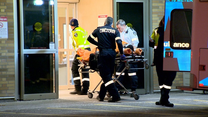 Toronto Paramedics rush a man with gun shot wounds to Sunnybrook Health Sciences Centre Wednesday evening.