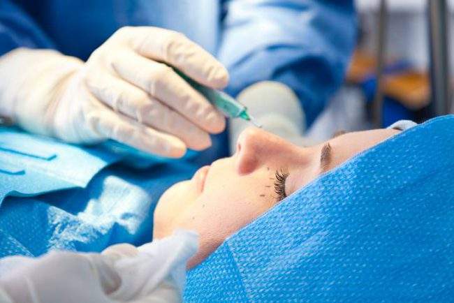 Thousands of pictures along with data has been posted online after a chain of plastic surgery clinics in Europe was hacked.