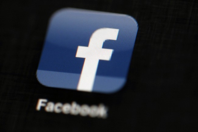 In this May 16, 2012, file photo, the Facebook logo is displayed on an iPad.