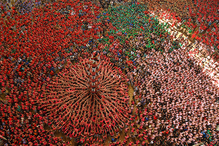 Members of a human tower team form a “castell” during the XXVI human towers competition in Tarragona, Spain on Oct. 2, 2016.