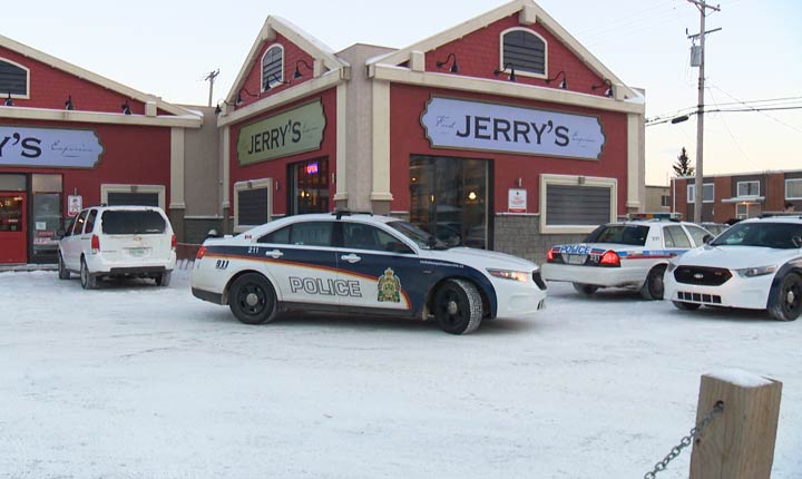 Police arrested two armed men following two similarly-executed robberies that took place on Boxing Day in Saskatoon.