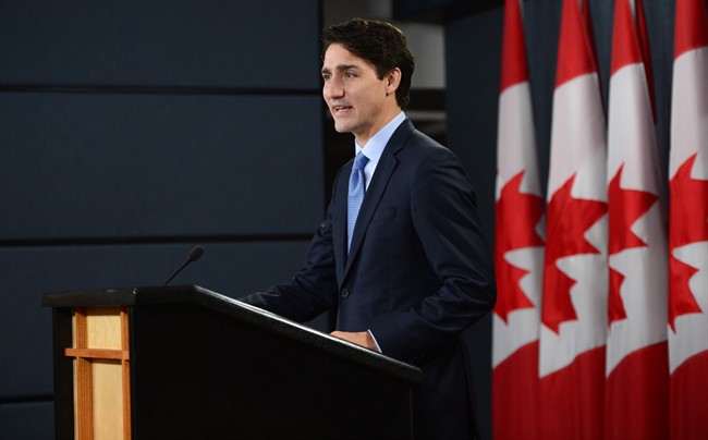 Prime Minister Justin Trudeau holds a press conference at the National Press Theatre in Ottawa on Monday, Dec. 12, 2016. 
