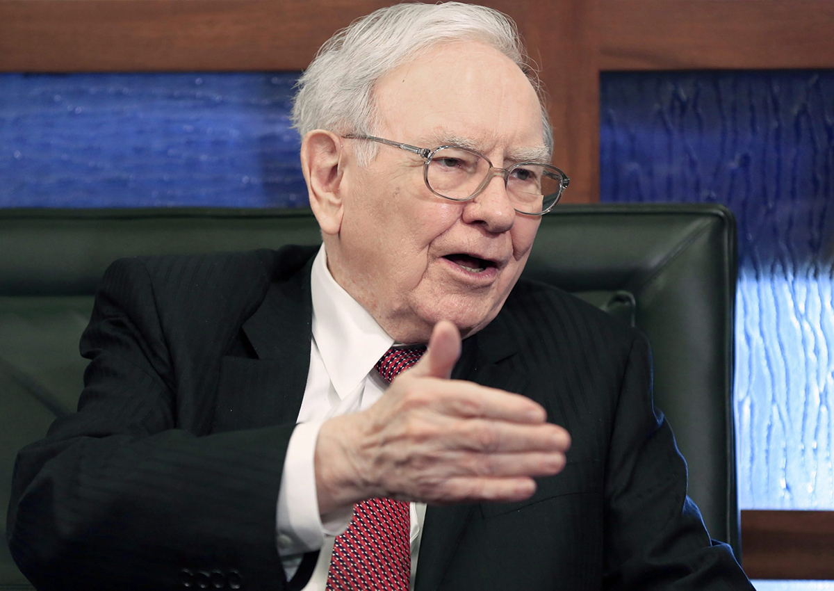 In this Monday, May 4, 2015, file photo, Berkshire Hathaway Chairman and CEO Warren Buffett speaks during an interview with Liz Claman on the Fox Business Network in Omaha, Neb.