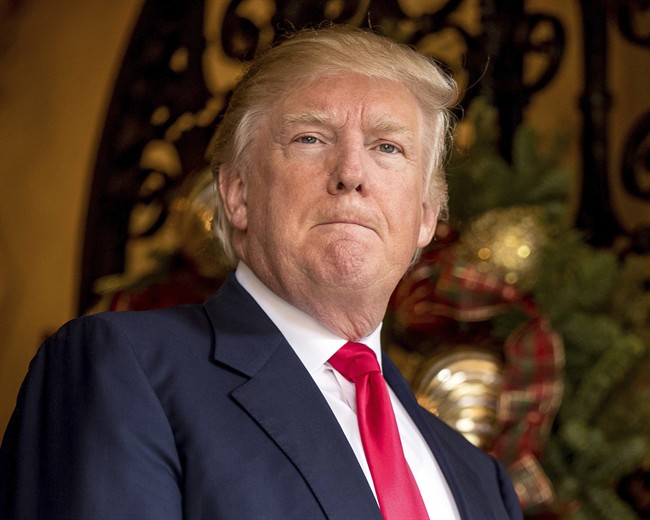 President-elect Donald Trump takes a question from a member of the media at Mar-a-Lago, in Palm Beach, Fla., Wednesday, Dec. 21, 2016. 