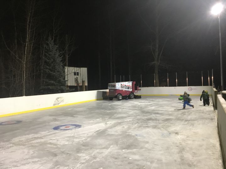 Jesse Myshak takes his Zamboni for a spin on his backyard rink just outside of Stony Plain, Alta.