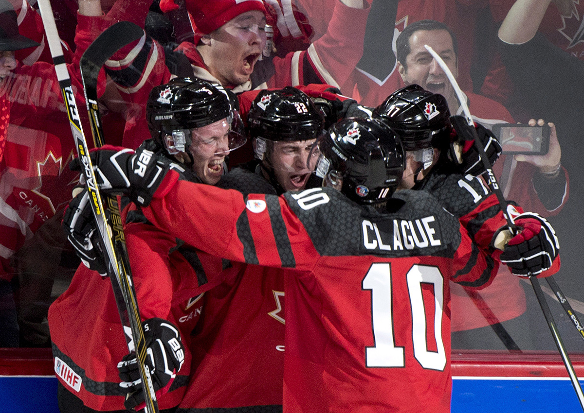 Canada's Anthony Cirelli celebrates his goal against Sweden with teammates during first period IIHF World Junior Championship semifinals hockey action Wednesday, January 4, 2017 in Montreal. 