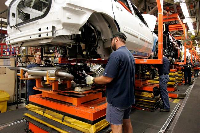 Production of the General Motors’ CAMI Automotive facility in Ingersoll, Ontario, is shown in this Thursday, Dec. 21, 2006 file photo.