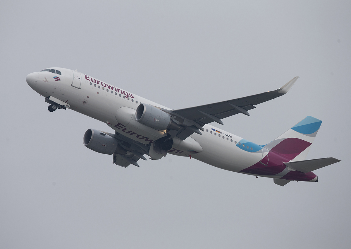 An Eurowings passenger aircraft, the low-cost carrier operated by Deutsche Lufthansa AG, takes off from Duesseldorf airport, operated by Flughafen Duesseldorf GmbH, in Duesseldorf, Germany, on Tuesday, March 1, 2016.