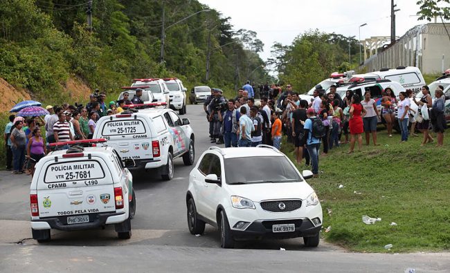 Relatives of inmates gather at the main gate of the Anisio Jobim Penitentiary Complex to ask for information after a riot at the prison left at least 60 people killed and several injured, in Manaus, Amazonia state, Brazil on January 2, 2017.