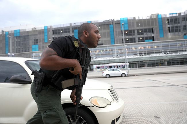 First responders secure the area outside the Fort Lauderdale-Hollywood International airport after a shooting took place near the baggage claim on January 6, 2017.