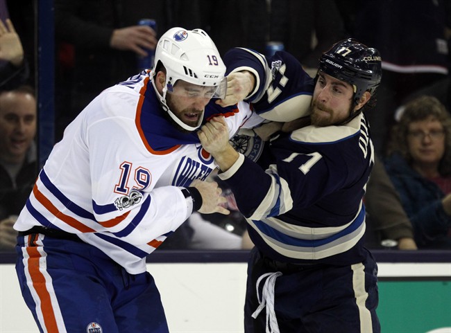 Columbus Blue Jackets forward Brandon Dubinsky, right, fights with Edmonton Oilers forward Patrick Maroon during the second period of an NHL hockey game in Columbus, Ohio, Tuesday, Jan. 3, 2017. 