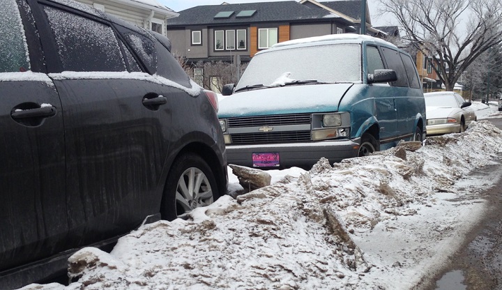 Vehicles stuck behind windrows in Calgary.