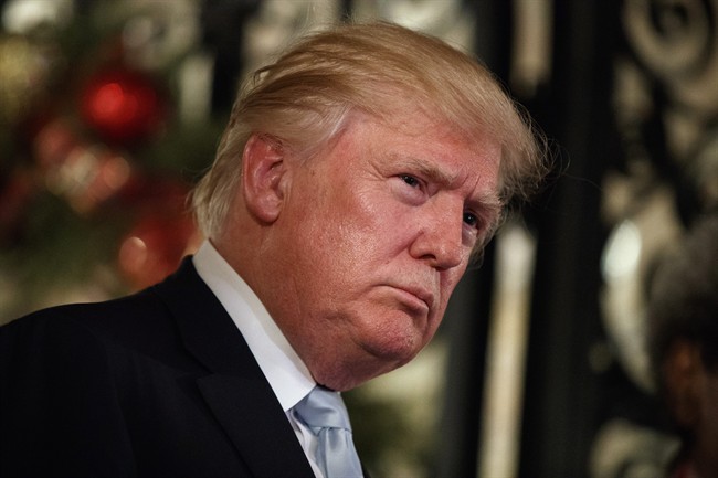 President-elect Donald Trump listens to a question as he speaks to reporters at Mar-a-Lago, in Palm Beach, Fla. in this Dec. 28, 2016 file photo.