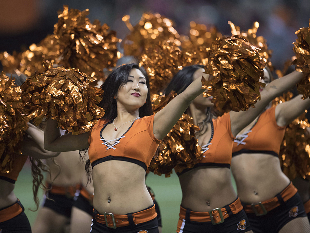 There's more to cheerleading than pom-poms and skimpy outfits. The women who make up these teams have their eye on the prize, and it has little to do with football.