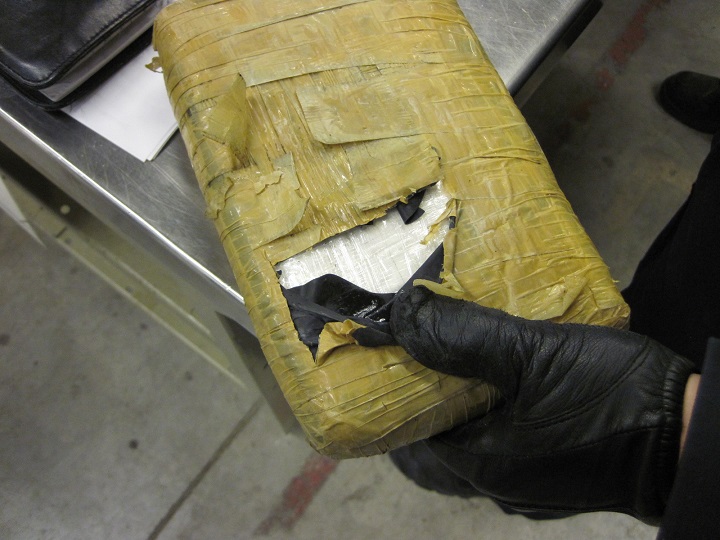 Border officials say the packages tested positive for suspected cocaine.