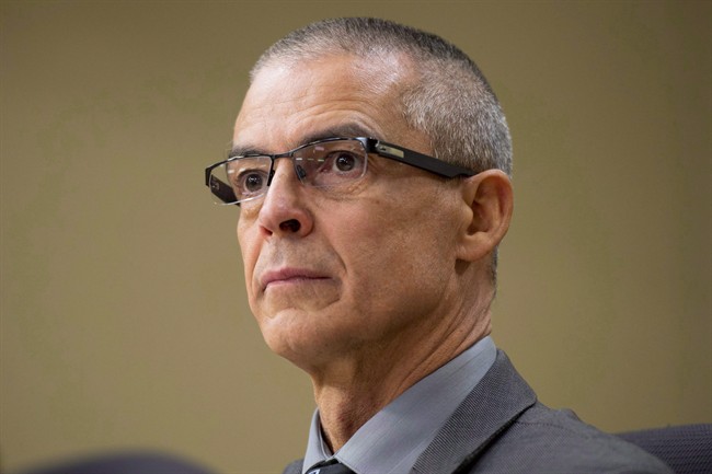 CSIS director Michel Coulombe waits to appear at the Senate national security committee meeting to discuss Bill C-51, the anti-terrorism Act, in Ottawa on April 20, 2015. THE CANADIAN PRESS/Adrian Wyld.