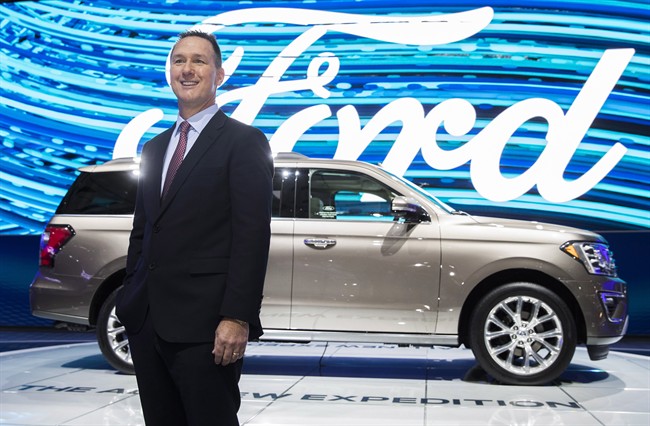 Ford Canada's new president and CEO says the company's financial commitment to auto manufacturing in Canada has not wavered since the election of U.S. President Donald Trump. Ford Canada President Mark Buzzell poses in front of the 2017 Ford Expedition during the Canadian International Autoshow, in Toronto on Thursday, February 16, 2017.