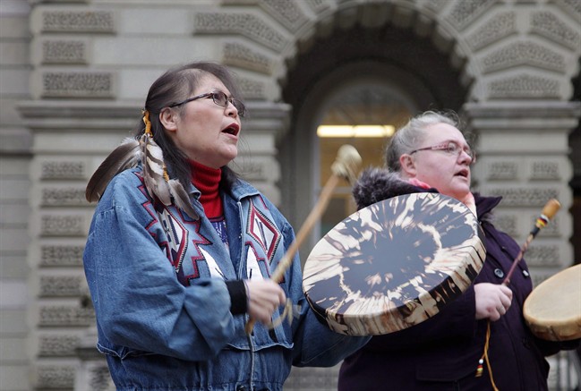 Marcia Brown Martel (left) is seen outside court in Toronto on Thursday, Dec. 1, 2016.