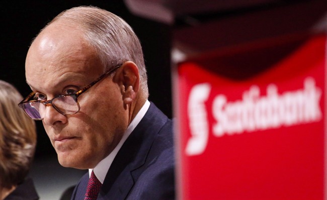 Brian Porter, president and CEO of Scotiabank, waits to address the company's annual meeting in Calgary, Tuesday, April 12, 2016. Porter says he's concerned about the possibility of a housing market correction in Toronto and Vancouver.