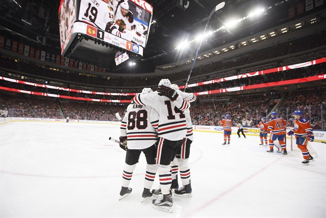 Chicago Blackhawks celebrate a goal against the Edmonton Oilers during first period NHL action in Edmonton, Alta., on Saturday February 11, 2017. 
