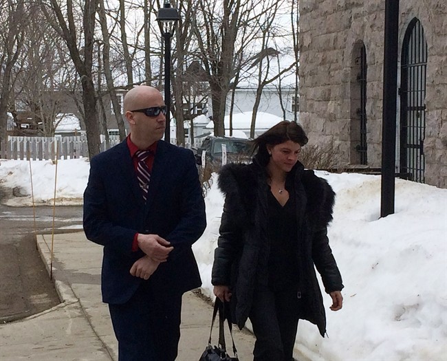 Const. Patrick Bulger, left, walks into the courthouse in Bathurst, NB. on Friday, February 24, 2017. 