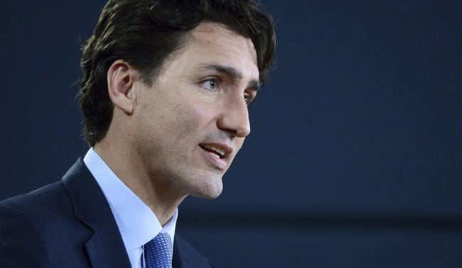 In this Nov. 29, 2016 file photo, Canada's Prime Minister Justin Trudeau holds a press conference at the National Press Theatre in Ottawa, Ontario. On Monday, Feb. 13, 2017. (Sean Kilpatrick/The Canadian Press via AP, File).