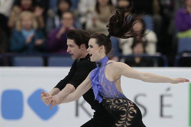 Tessa Virtue and Scott Moir, of Canada, skate their short dance at the World Figure Skating Championships in Helsinki, Finland, on Friday, March 31, 2017.