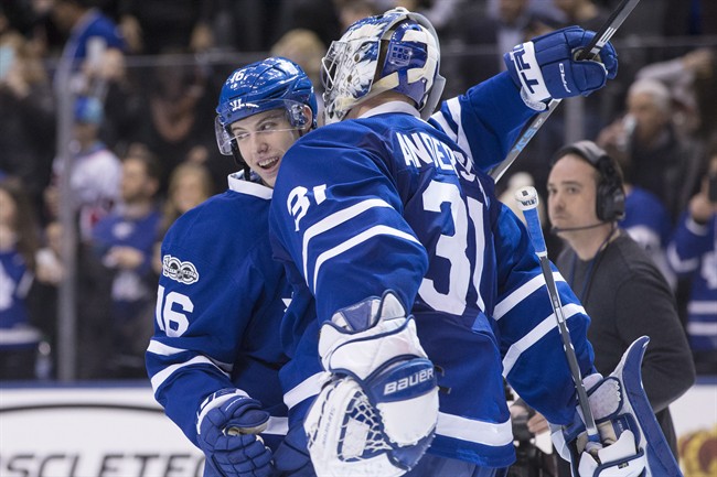 Toronto Maple Leafs' Mitchell Marner (16) celebrates with Toronto Maple Leafs goalie Frederik Andersen after their 4-2 win over the Philadelphia Flyers following NHL hockey action, in Toronto on Thursday, March 9, 2017.