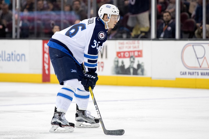 Nelson Nogier prepares for a face-off during the first period of an AHL hockey game between the Manitoba Moose and Cleveland Monsters on Feb 10, 2017.