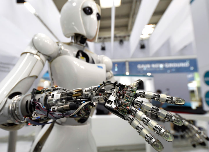 A robot is displayed at the Robotics Innovation Center booth during preparations at the CeBit computer fair, which will open its doors to the public on March 20, at the fairground in Hanover, Germany, March 18, 2017.