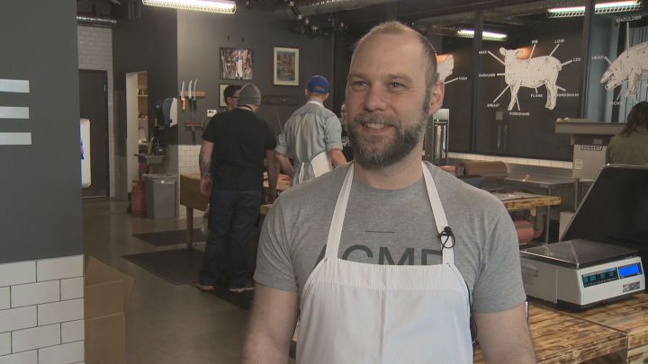 Corey Meyer, owner and butcher at Acme Meat Market, said business was doing well on the meat market's first day inside the Ritchie Market. March 21, 2017.