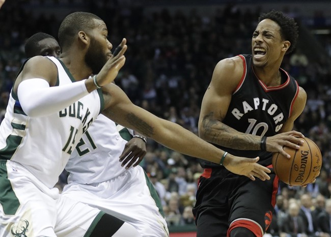 Toronto Raptors’ DeMar DeRozan drives against Milwaukee Bucks\’ Greg Monroe during the first half of game 6 of an NBA first-round playoff series basketball game Thursday, April 27, 2017, in Milwaukee.