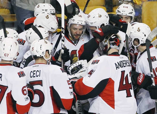 Ottawa Senators’ Clarke MacArthur (16) celebrates with teammates after scoring during overtime in game six of a first-round NHL hockey Stanley Cup playoff series against the Boston Bruins, Sunday, April 23, 2017, in Boston. The Senators won 3-2.