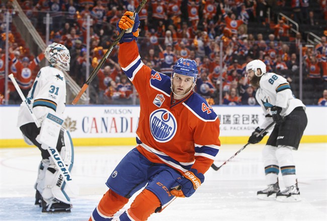 San Jose Sharks' Martin Jones (31) and Brent Burns (88) react as Edmonton Oilers' Zack Kassian (44) celebrates his goal during second period NHL playoff action in Edmonton, Alta., on Friday April 14, 2017. THE CANADIAN PRESS/Jason Franson.