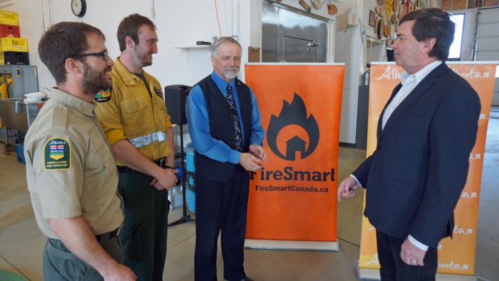 The Alberta government says it will spend $45 million over the next three years to help protect communities from wildfires.