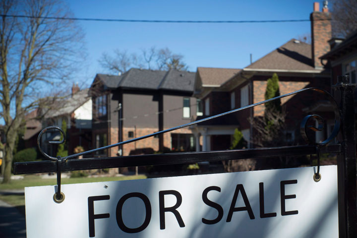 A for sale sign on a house