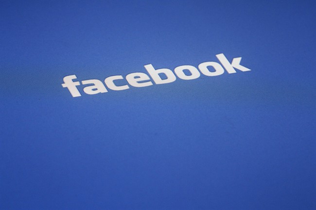 FILE - In this Wednesday, May 16, 2012, file photo, a Facebook logo is displayed on the screen of an iPad, in New York. A Halifax-area navy sailor has been jailed three years for sexually assaulting a woman he met over Facebook.