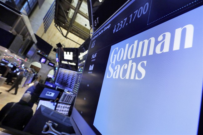 The Goldman Sachs logo appears above a trading post on the floor of the New York Stock Exchange, Dec. 13, 2016.