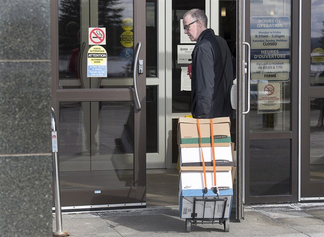 Federal Crown prosecutor Paul Adams arrives at court for the start of the RCMP's trial on violating four charges of the Canada Labour Code in Moncton, N.B. on Monday, April 24, 2017.