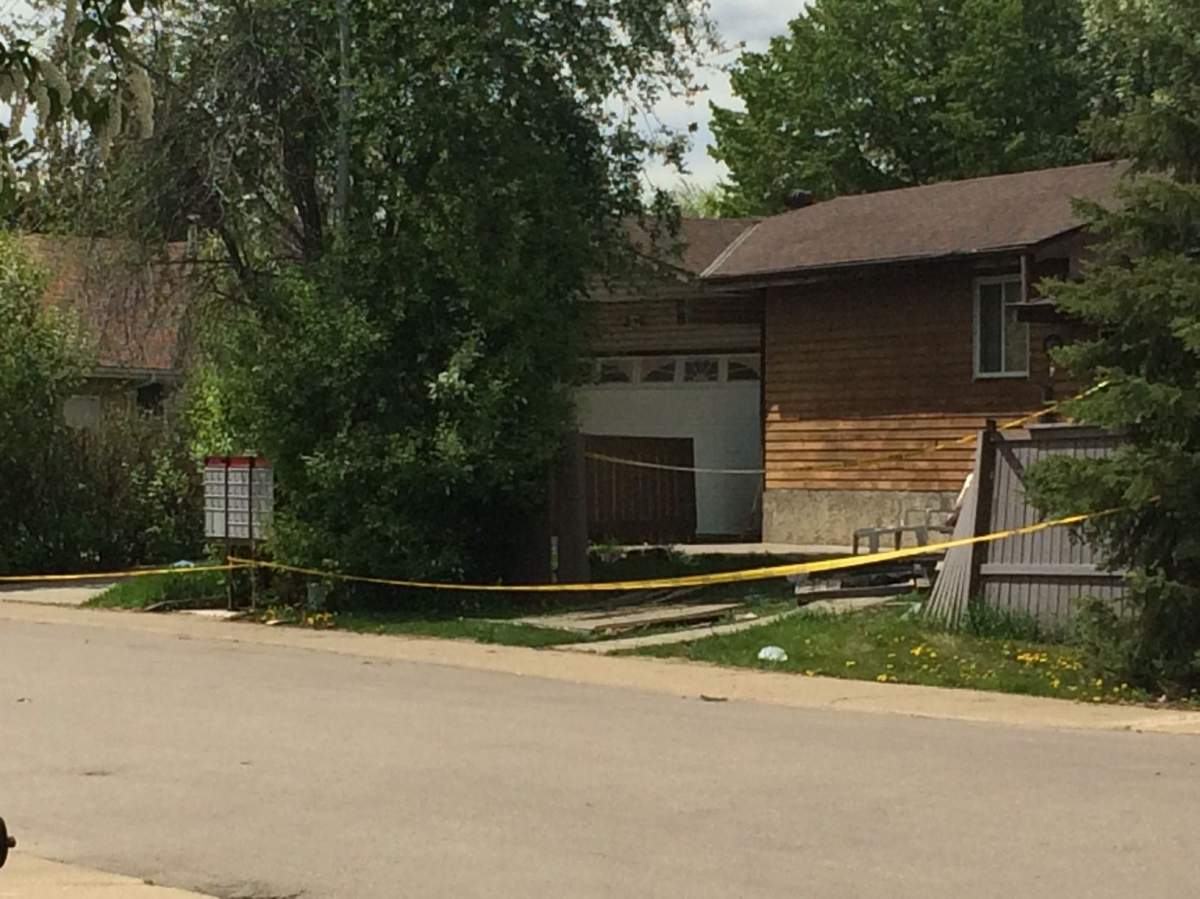 Police tape surrounds an area in west Edmonton after a hit and run, Monday, May 22, 2017.