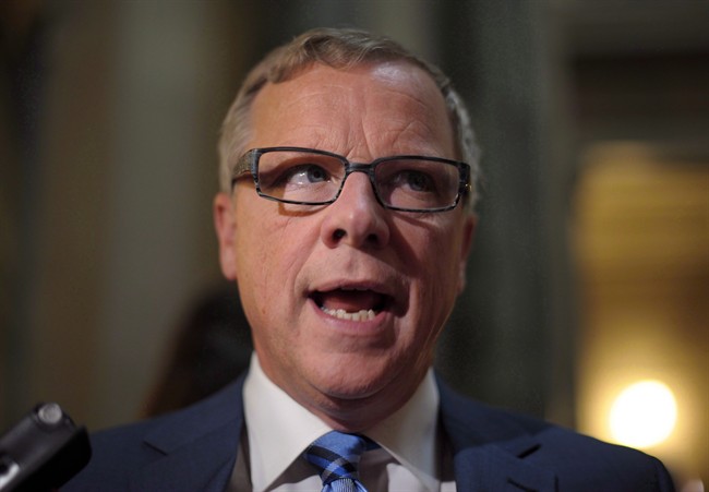 Saskatchewan Premier Brad Wall criticizes attempt to link carbon policy with green infrastructure dollars.