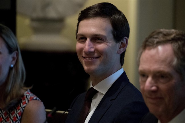 White House Senior Adviser Jared Kushner, centre, accompanied by U.S. Trade Representative Robert Lighthizer, right.