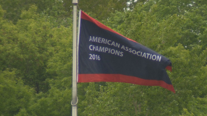 The Winnipeg Goldeyes raise their 2016 championship banner at Shaw Park.