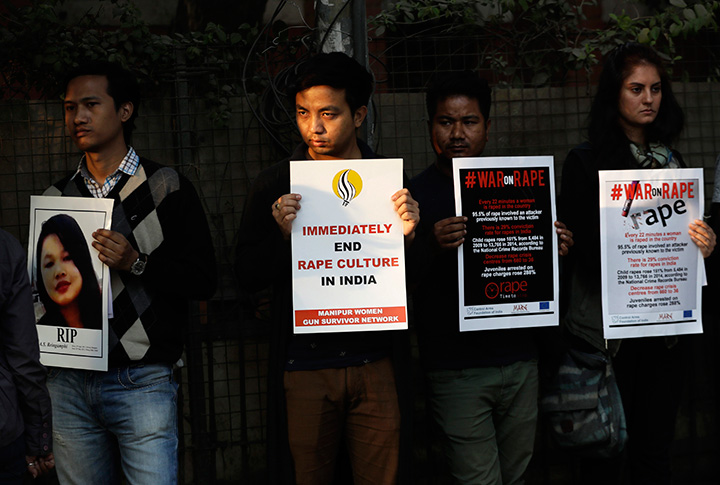 In this Feb. 21, 2017, file photo, Indians hold placards during a protest against an alleged rape in New Delhi, India. India's top court on Friday, May 8, 2017 upheld death sentences of four men who were convicted in the fatal gang-rape and torture of a 23-year-old medical student on a moving bus in the Indian capital nearly five years ago. 