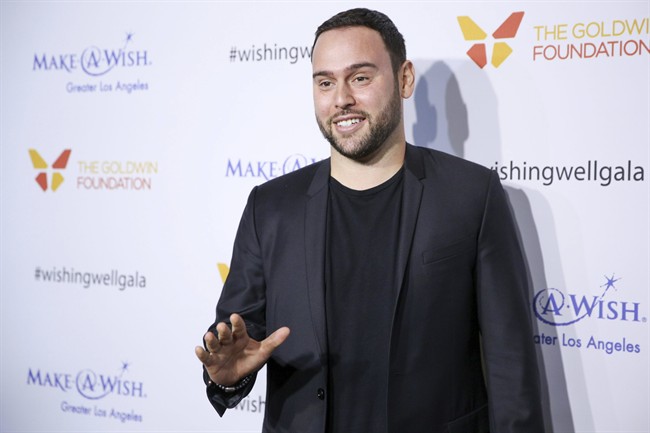 In this Dec. 7, 2016, file photo, Scooter Braun arrives at the 4th Annual Wishing Well Winter Gala at the Hollywood Palladium in Los Angeles, Calif.