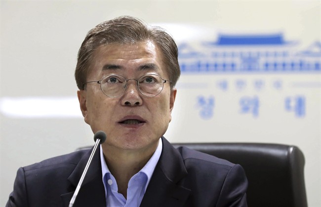 South Korean President Moon Jae-in speaks as he presides over a meeting of the National Security Council at the presidential Blue House in Seoul, South Korea.